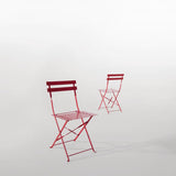 Bolero Red Pavement Style Steel Folding Chairs (Pack 2)